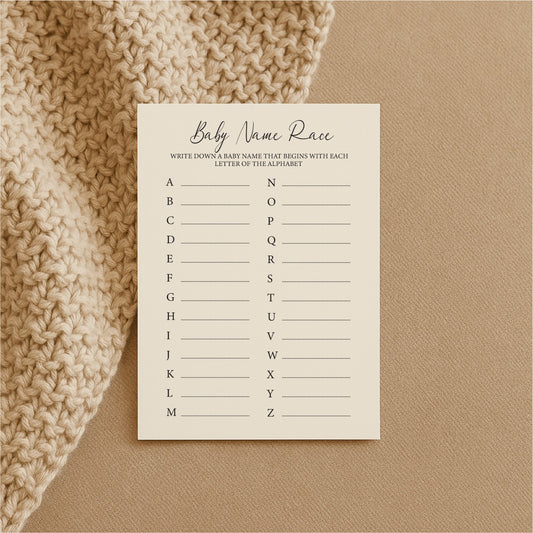 Babyshowerlek ”Namntävlingen!” – 10 lekfulla frågekort i krämfärgat papper från Beebila